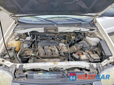 Zdjęcie 12 z 13 samochodu: 2003 FORD ESCAPE XLT VIN:1FMYU93103KA72837 - miniatura