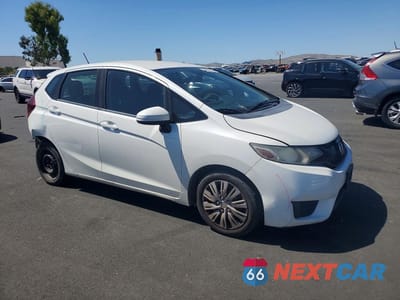 Czwarte zdjęcie samochodu z boku: 2016 HONDA FIT LX VIN:JHMGK5H53GX027487 - miniatura