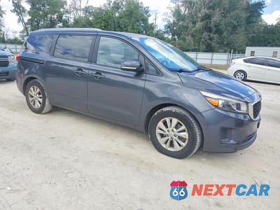 Czwarte zdjęcie samochodu z boku: 2015 KIA SEDONA LX VIN:KNDMB5C15F6020702 - miniatura