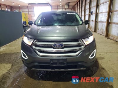 Piąte zdjęcie samochodu w środku: 2017 FORD EDGE TITANIUM VIN:2FMPK4K85HBB35161 - miniatura