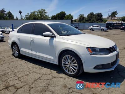 Czwarte zdjęcie samochodu z boku: 2014 VOLKSWAGEN JETTA SEL VIN:3VWL17AJ7EM441636 - miniatura