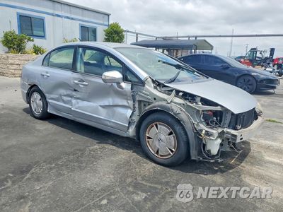 Czwarte zdjęcie samochodu z boku: 2006 HONDA CIVIC HYBRID VIN:JHMFA36206S025073 - miniatura