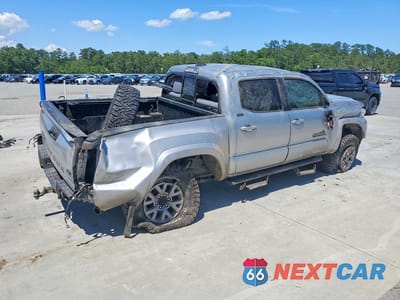 Trzecie zdjęcie samochodu z tyłu: 2019 TOYOTA TACOMA SR5 V6 VIN:3TMAZ5CN0KM103238 - miniatura