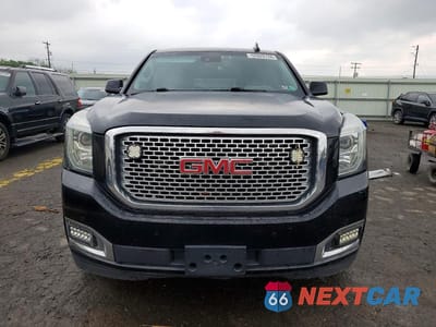 Piąte zdjęcie samochodu w środku: 2016 GMC YUKON XL DENALI VIN:1GKS2HKJXGR418793 - miniatura