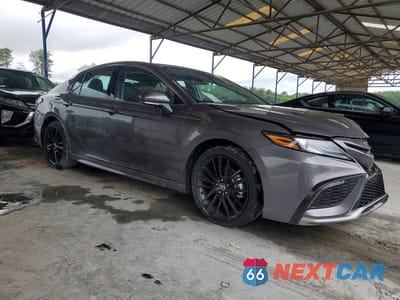 Czwarte zdjęcie samochodu z boku: 2024 TOYOTA CAMRY XSE VIN:4T1K61AKXRU859160 - miniatura
