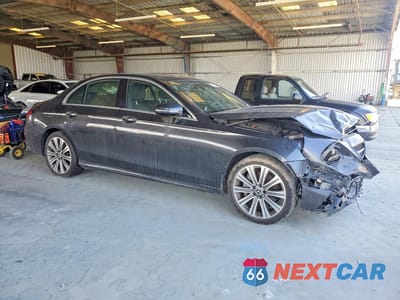Czwarte zdjęcie samochodu z boku: 2022 MERCEDES-BENZ E 350 VIN:W1KZF8DB1NB022011 - miniatura