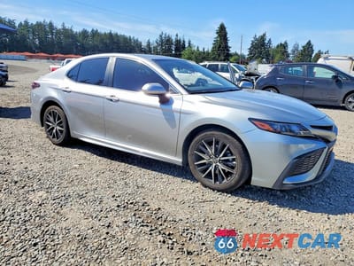 Czwarte zdjęcie samochodu z boku: 2023 TOYOTA CAMRY HYBRID SE VIN:4T1G31AK3PU615670 - miniatura