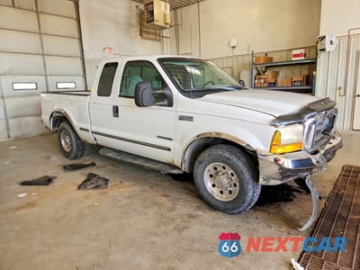Czwarte zdjęcie samochodu z boku: 1999 FORD F250 SUPER DUTY VIN:1FTNX20F9XEC41912 - miniatura