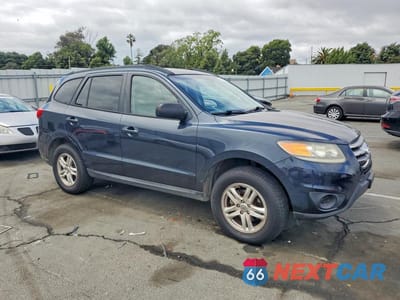 Czwarte zdjęcie samochodu z boku: 2012 HYUNDAI SANTA FE GLS VIN:5XYZG3AB2CG156978 - miniatura