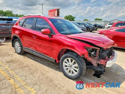 Czwarte zdjęcie samochodu z boku: 2015 MAZDA CX-5 TOURING VIN:JM3KE4CY2F0475443 - miniatura