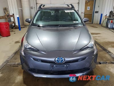 Piąte zdjęcie samochodu w środku: 2017 TOYOTA PRIUS TWO VIN:JTDKBRFU5H3041848 - miniatura
