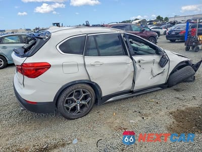 Trzecie zdjęcie samochodu z tyłu: 2019 BMW X1 SDRIVE28I VIN:WBXHU7C59K5L11202 - miniatura