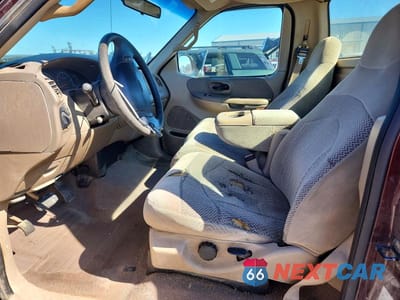 Zdjęcie 7 z 12 samochodu: 2000 FORD F150 VIN:1FTZF1721YNA94617 - miniatura