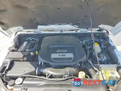 Zdjęcie 12 z 13 samochodu: 2014 JEEP WRANGLER UNLIMITED SAHARA VIN:1C4BJWEG0EL212501 - miniatura