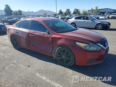 Czwarte zdjęcie samochodu z boku: 2018 NISSAN ALTIMA 2.5 SR VIN:1N4AL3AP4JC135531 - miniatura