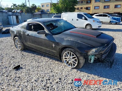 Czwarte zdjęcie samochodu z boku: 2014 FORD MUSTANG VIN:1ZVBP8AM8E5301434 - miniatura