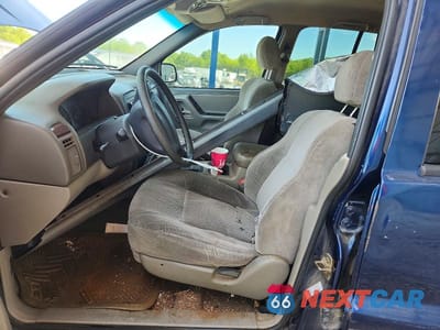 Zdjęcie 7 z 13 samochodu: 2000 JEEP GRAND CHEROKEE LAREDO VIN:1J4GW48S1YC357329 - miniatura