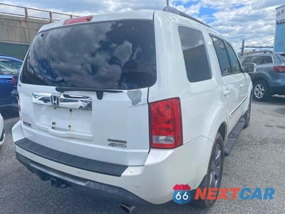 Czwarte zdjęcie samochodu z boku: 2012 HONDA PILOT TOURING VIN:5FNYF4H97CB019114 - miniatura