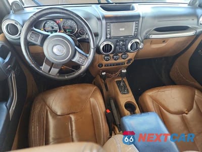 Zdjęcie 8 z 13 samochodu: 2013 JEEP WRANGLER UNLIMITED SAHARA VIN:1C4BJWEGXDL687930 - miniatura