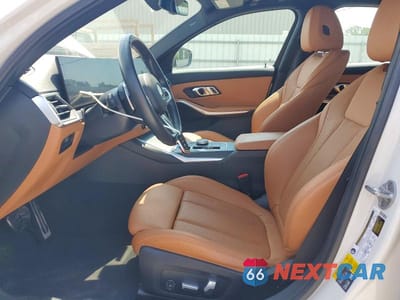 Zdjęcie 7 z 12 samochodu: 2023 BMW 330E VIN:3MW39FF04P8D17063 - miniatura