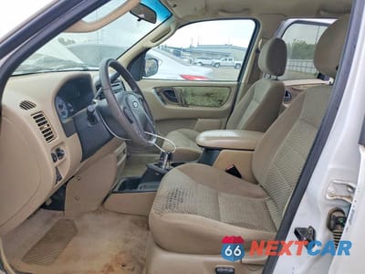 Zdjęcie 7 z 13 samochodu: 2003 FORD ESCAPE XLT VIN:1FMYU93103KA72837 - miniatura