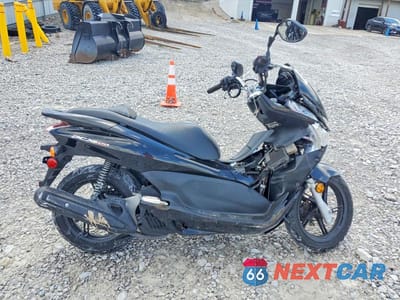 2013 HONDA PCX 150 MLHKF1210D5006454 - główne zdjęcie licytacji z USA - miniatura