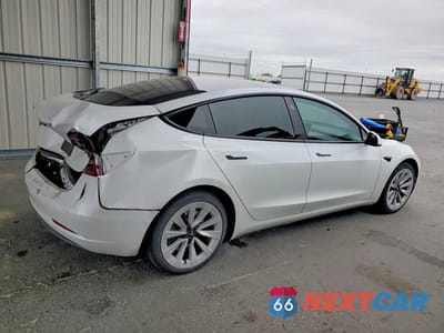 Trzecie zdjęcie samochodu z tyłu: 2022 TESLA MODEL 3 VIN:5YJ3E1EA1NF361977 - miniatura