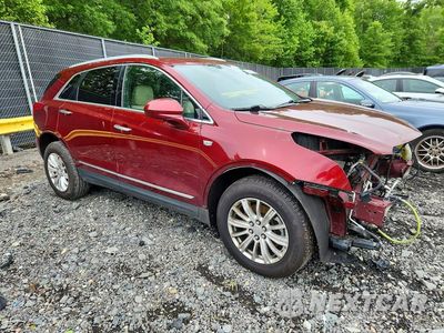 Czwarte zdjęcie samochodu z boku: 2017 CADILLAC XT5 VIN:1GYKNARS7HZ323905 - miniatura