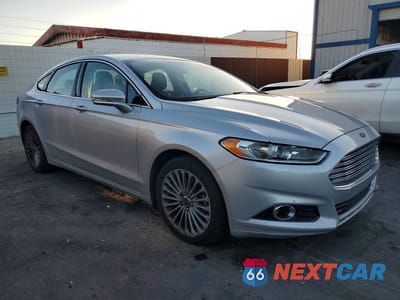 Czwarte zdjęcie samochodu z boku: 2016 FORD FUSION TITANIUM VIN:3FA6P0K92GR307560 - miniatura