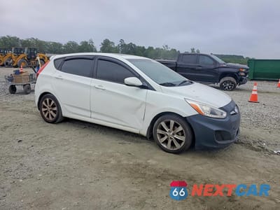 Czwarte zdjęcie samochodu z boku: 2014 HYUNDAI ACCENT SE VIN:KMHCU5AE7EU183630 - miniatura