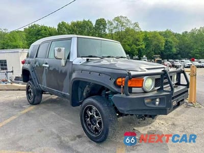 Czwarte zdjęcie samochodu z boku: 2007 TOYOTA FJ CRUISER BASE VIN:JTEBU11F470062514 - miniatura