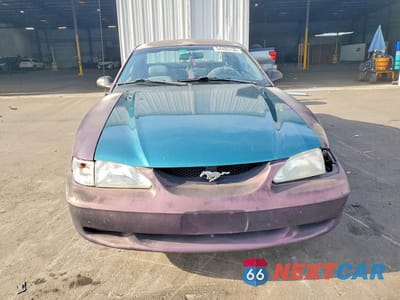 Piąte zdjęcie samochodu w środku: 1996 FORD MUSTANG VIN:1FALP4042TF170001 - miniatura