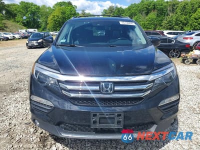 Piąte zdjęcie samochodu w środku: 2016 HONDA PILOT TOURING VIN:5FNYF6H90GB035320 - miniatura