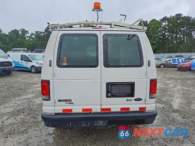 Zdjęcie 6 z 12 samochodu: 2014 FORD ECONOLINE E150 VAN VIN:1FTNE1EWXEDA65805 - miniatura