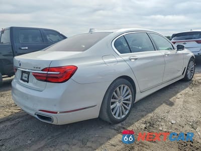 Trzecie zdjęcie samochodu z tyłu: 2016 BMW 740 I VIN:WBA7E2C50GG503836 - miniatura
