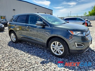 Czwarte zdjęcie samochodu z boku: 2015 FORD EDGE SEL VIN:2FMTK4J98FBB64921 - miniatura
