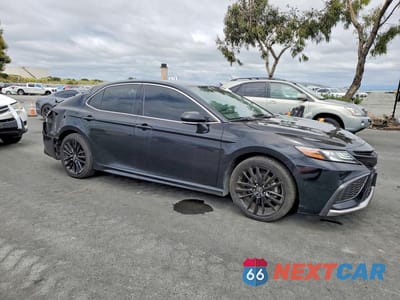 Czwarte zdjęcie samochodu z boku: 2022 TOYOTA CAMRY XSE VIN:4T1K61AK5NU621436 - miniatura