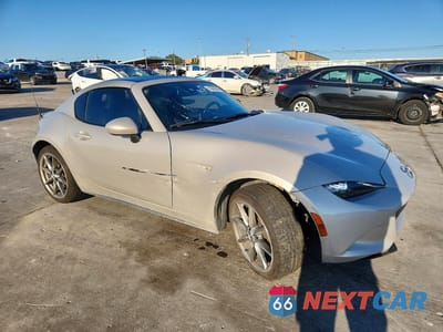 Czwarte zdjęcie samochodu z boku: 2022 MAZDA MX-5 MIATA GRAND TOURING VIN:JM1NDAM78N0505878 - miniatura
