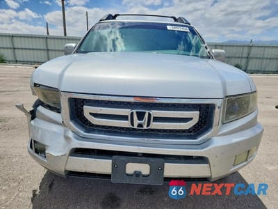 Piąte zdjęcie samochodu w środku: 2011 HONDA RIDGELINE RTL VIN:5FPYK1F59BB004095 - miniatura