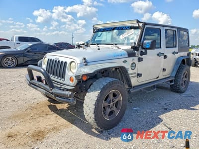 2011 JEEP WRANGLER UNLIMITED SPORT 1J4BA3H17BL582713 - główne zdjęcie licytacji z USA - miniatura