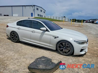Czwarte zdjęcie samochodu z boku: 2018 BMW M5 VIN:WBSJF0C53JB283227 - miniatura