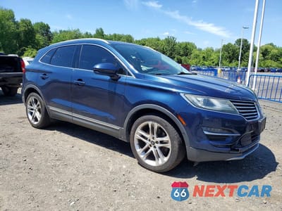 Czwarte zdjęcie samochodu z boku: 2015 LINCOLN MKC VIN:5LMCJ2A94FUJ00695 - miniatura