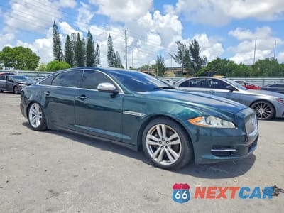 Czwarte zdjęcie samochodu z boku: 2013 JAGUAR XJL PORTFOLIO VIN:SAJWA2GB5DLV40122 - miniatura