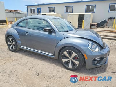 Czwarte zdjęcie samochodu z boku: 2014 VOLKSWAGEN BEETLE TURBO VIN:3VWVT7AT6EM662472 - miniatura