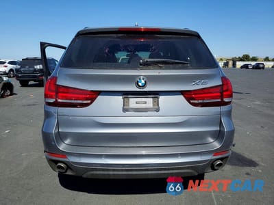 Zdjęcie 6 z 13 samochodu: 2014 BMW X5 XDRIVE35I VIN:5UXKR0C5XE0K47750 - miniatura