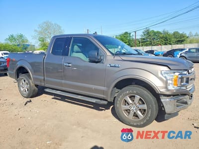Czwarte zdjęcie samochodu z boku: 2019 FORD F150 SUPER CAB VIN:1FTFX1E51KFB42390 - miniatura