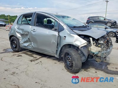Czwarte zdjęcie samochodu z boku: 2010 TOYOTA YARIS BASE VIN:JTDKT4K38A5297988 - miniatura