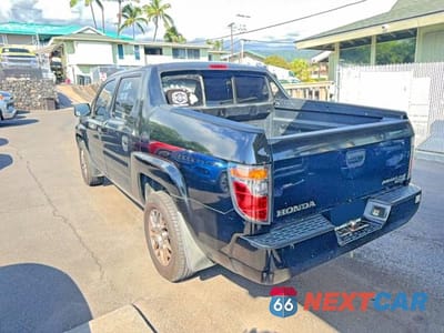 Trzecie zdjęcie samochodu z tyłu: 2006 HONDA RIDGELINE RT VIN:2HJYK16286H570811 - miniatura