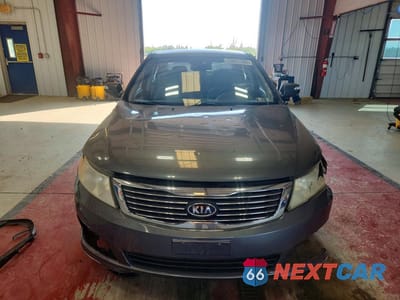 Piąte zdjęcie samochodu w środku: 2009 KIA OPTIMA LX VIN:KNAGE228795308424 - miniatura