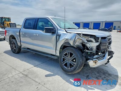 Czwarte zdjęcie samochodu z boku: 2022 FORD F150 SUPERCREW VIN:1FTFW1E57NKE81511 - miniatura